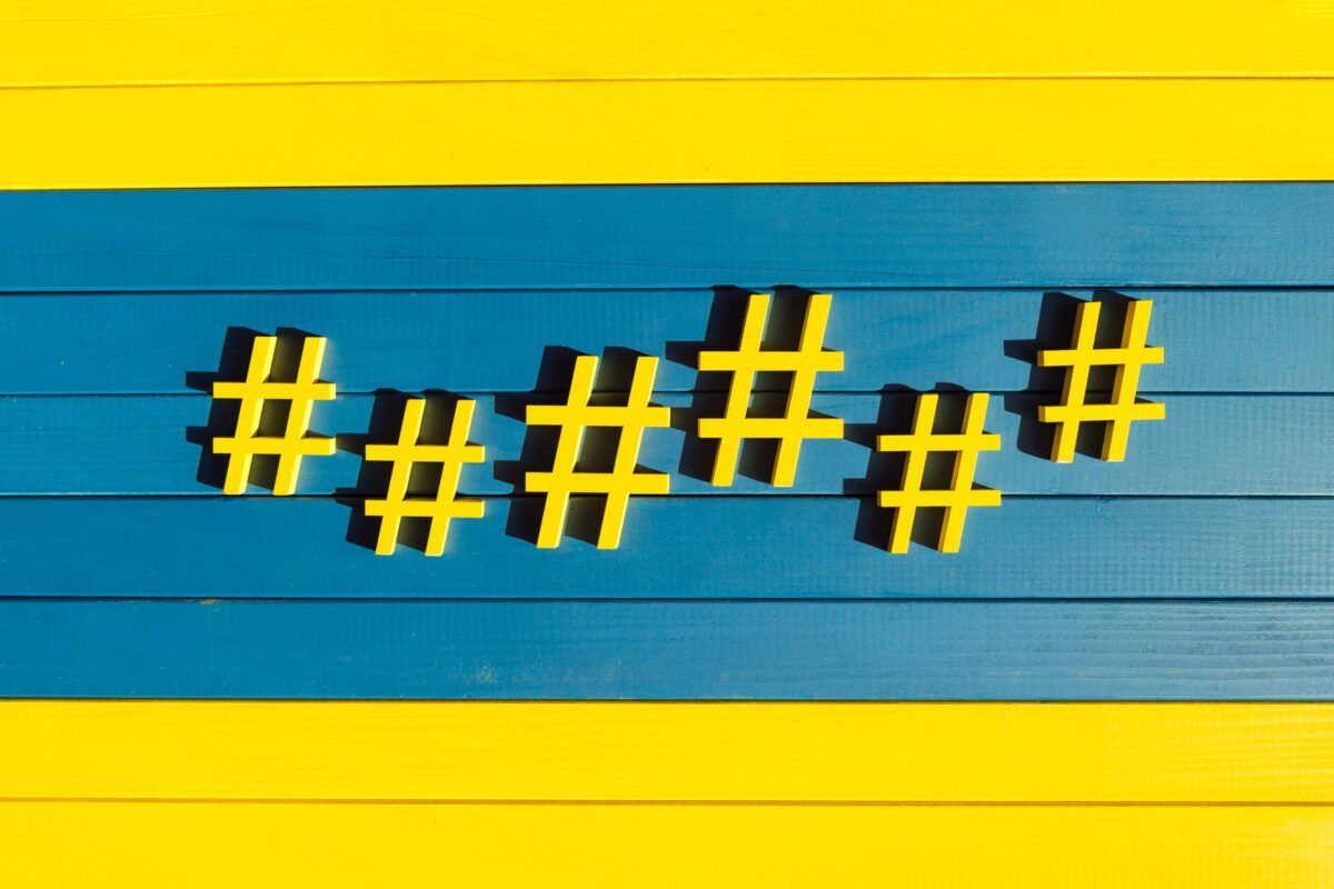 hashtags on a shiplap board