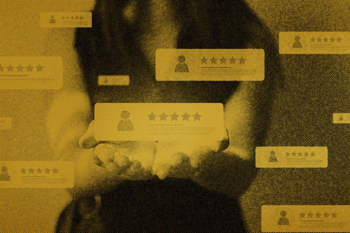 A woman holds five-star reviews and other customer feedback in her hands