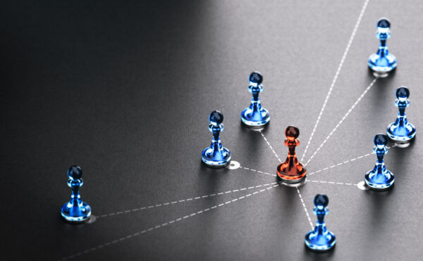 red and blue game pieces connected to each other strategically